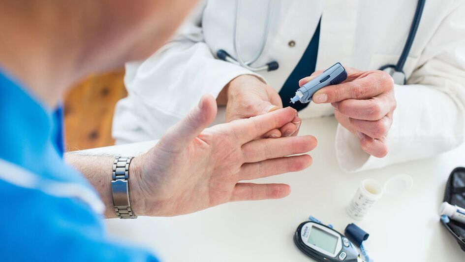 doctor takes blood for diabetes sugar